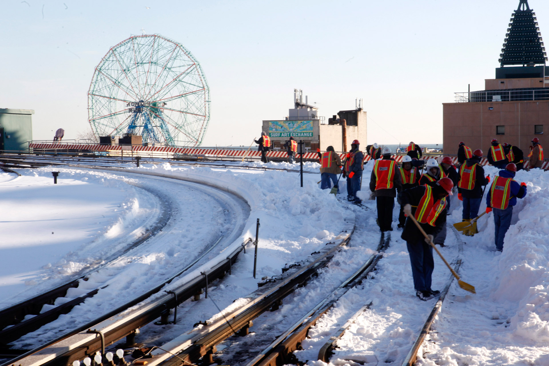 Transit workers clear tracks near Coney Island that were covered by snow during the December 2010 blizzard.