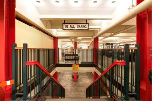 A view of the stairs down to the platform level at the Transit Museum.