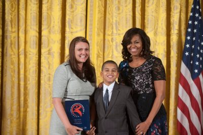 First Lady Michelle Obama, Subway Sleuth Ian Acquino, and Deputy Director Regina Asborno at White House Award Ceremony