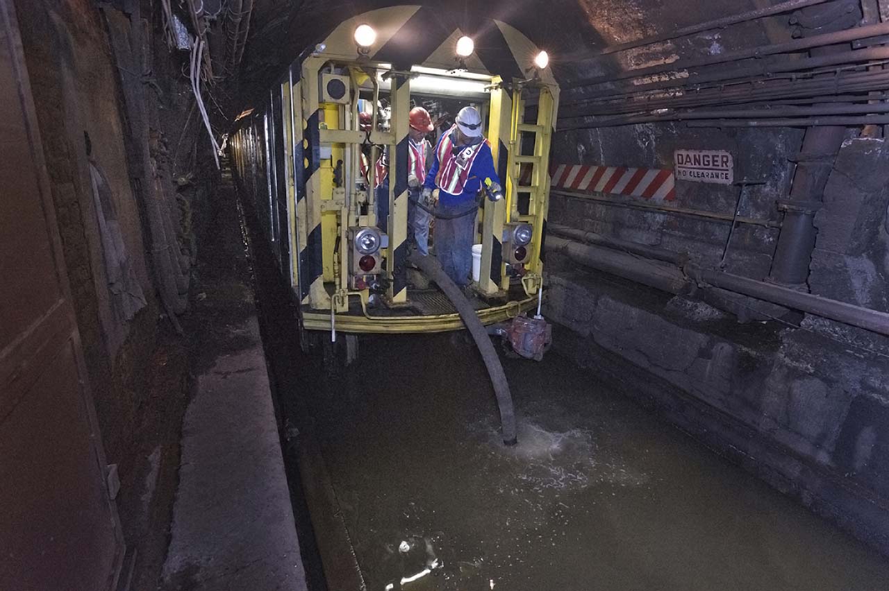 Hydraulics operators pumping seawater from the L line tunnel under the East River. MTA/Patrick Cashin, 2012