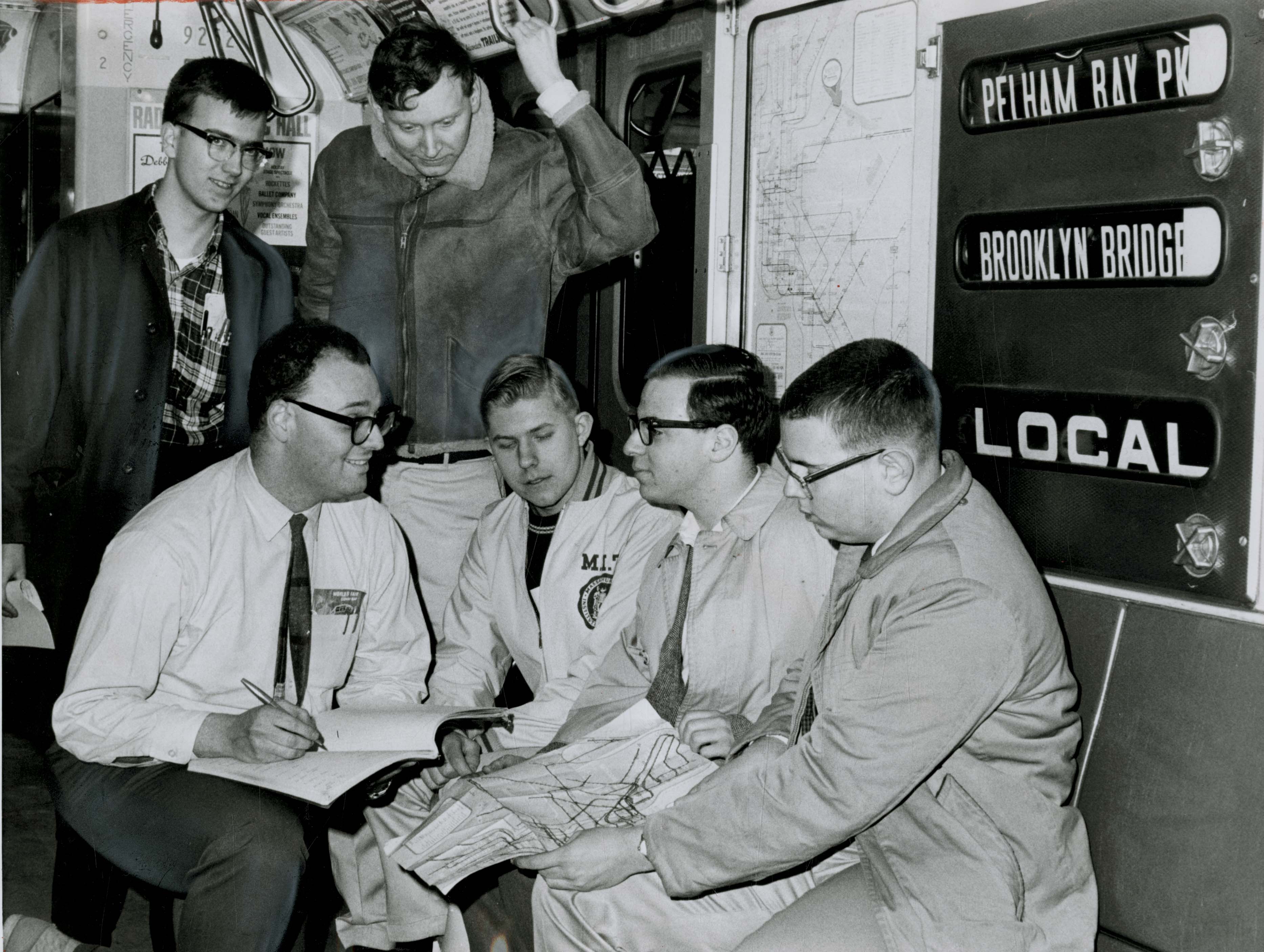 Peter Samson (hanging on strap) and his M.I.T. schoolmates during their 1966 riding attempt. They would miss the record by less than two minutes, but try again in 1967.