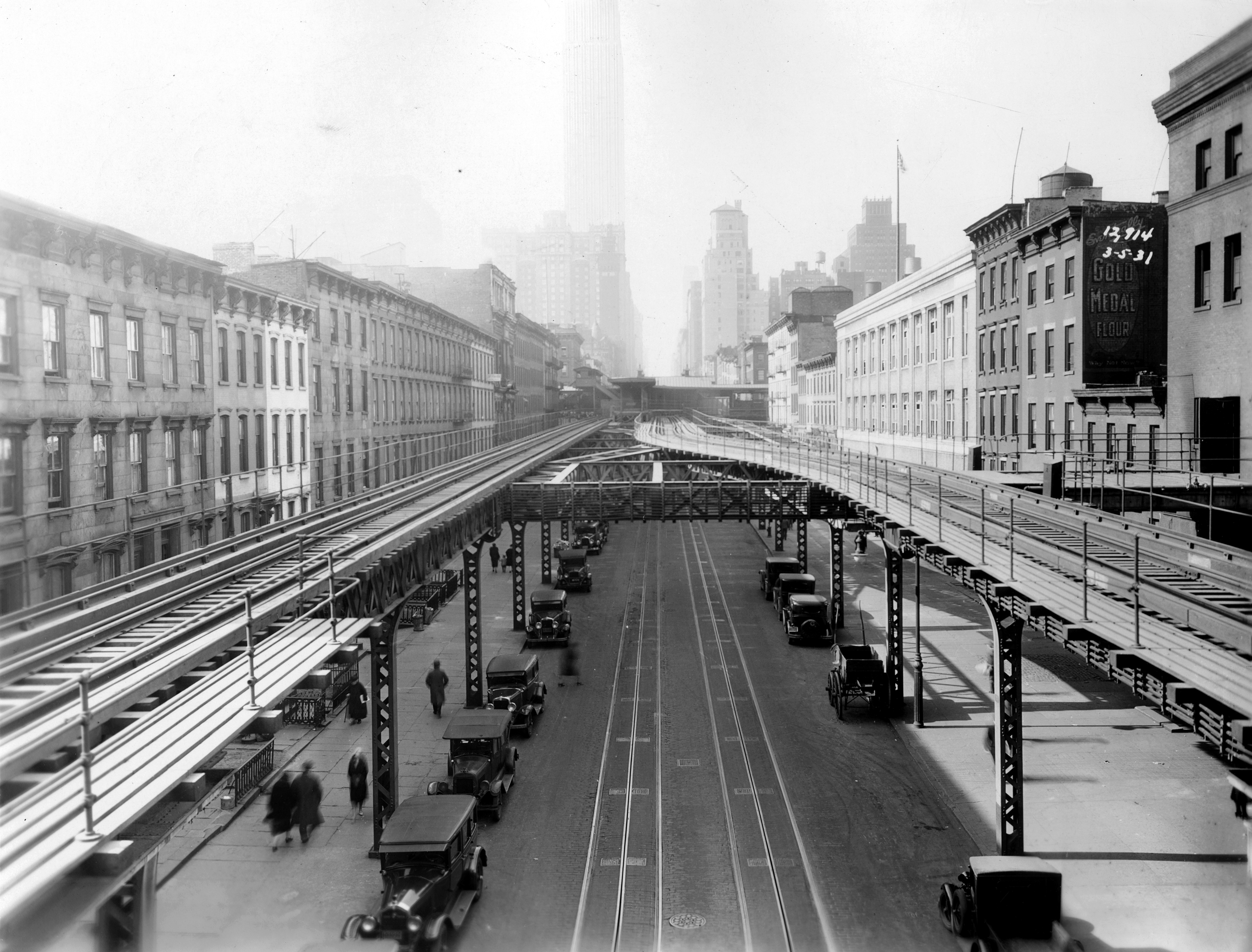 View of Third Avenue with elevated train structures visible