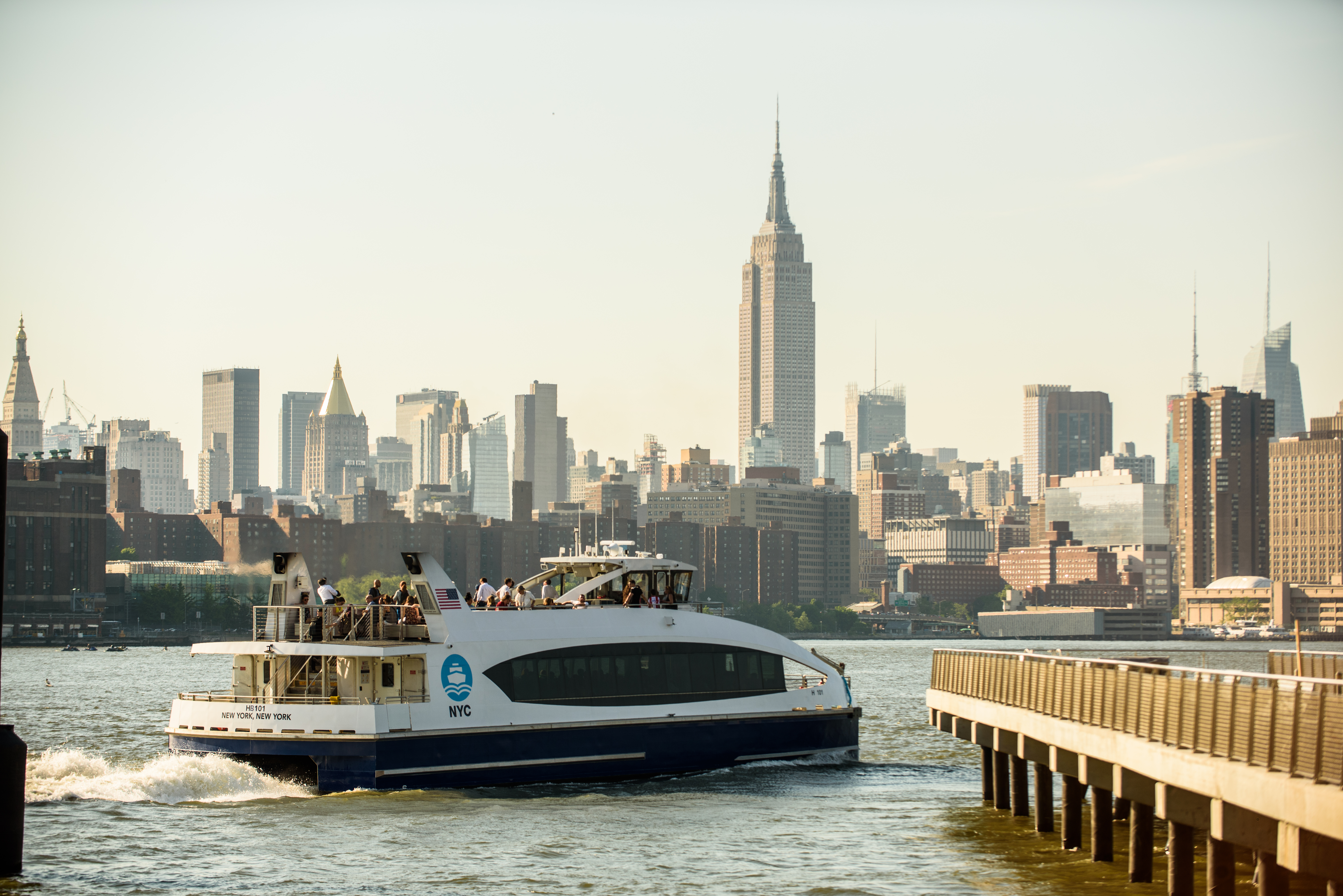 NYC Ferry in front of the Manhattan skyline