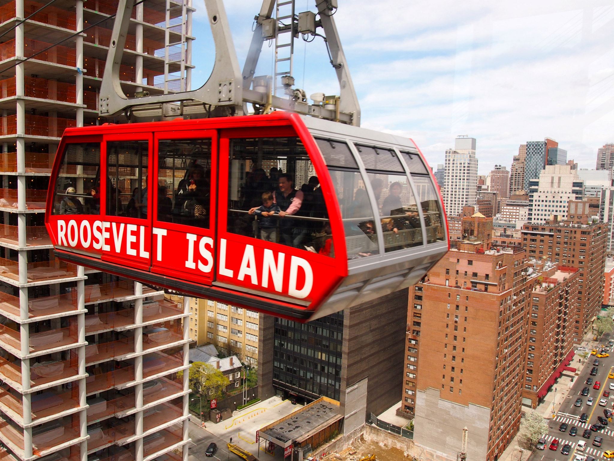 Roosevelt Island Tram above NYC skyline.