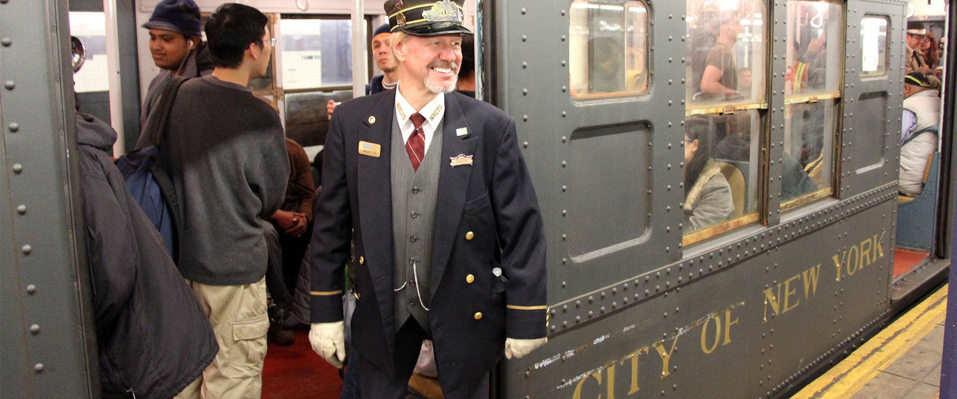 Conductor with vintage 1930s train