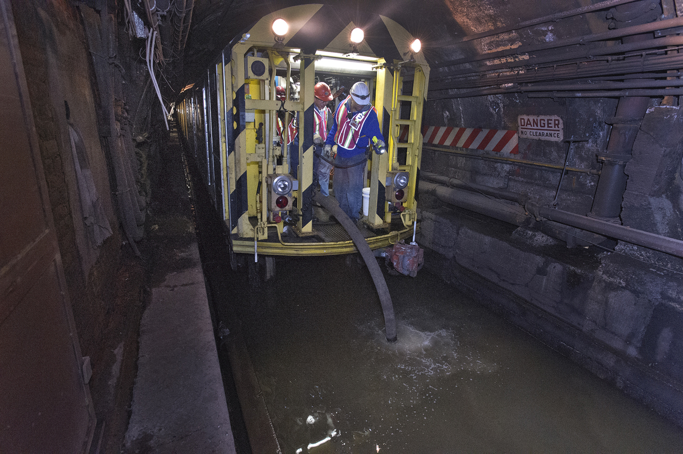 MTA workers draining tunnel