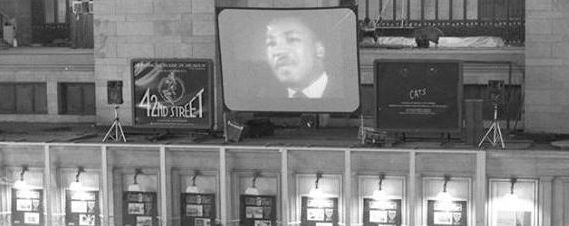 Martin Luther King Jr appears on a large screen in Grand Central Terminal.