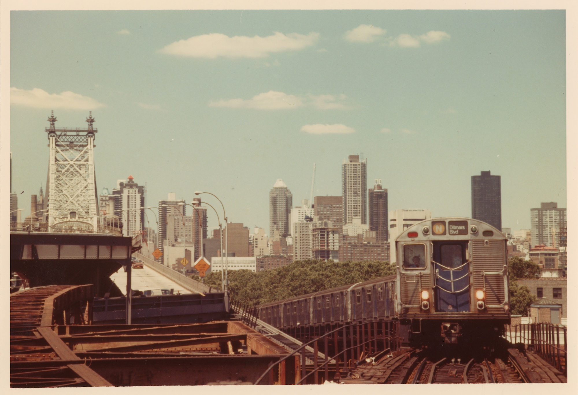 Photo of R-32 against NYC Skyline with Bridge visabile.