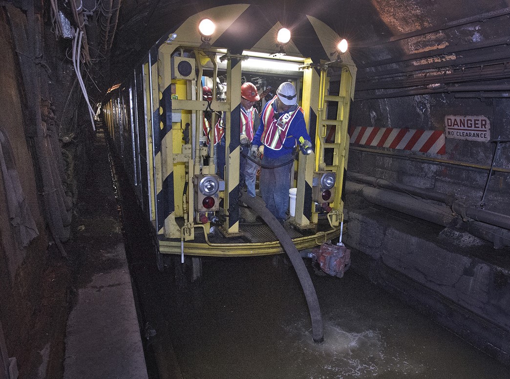 MTA workers draining tunnel