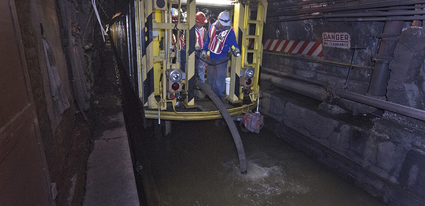 MTA workers draining tunnel