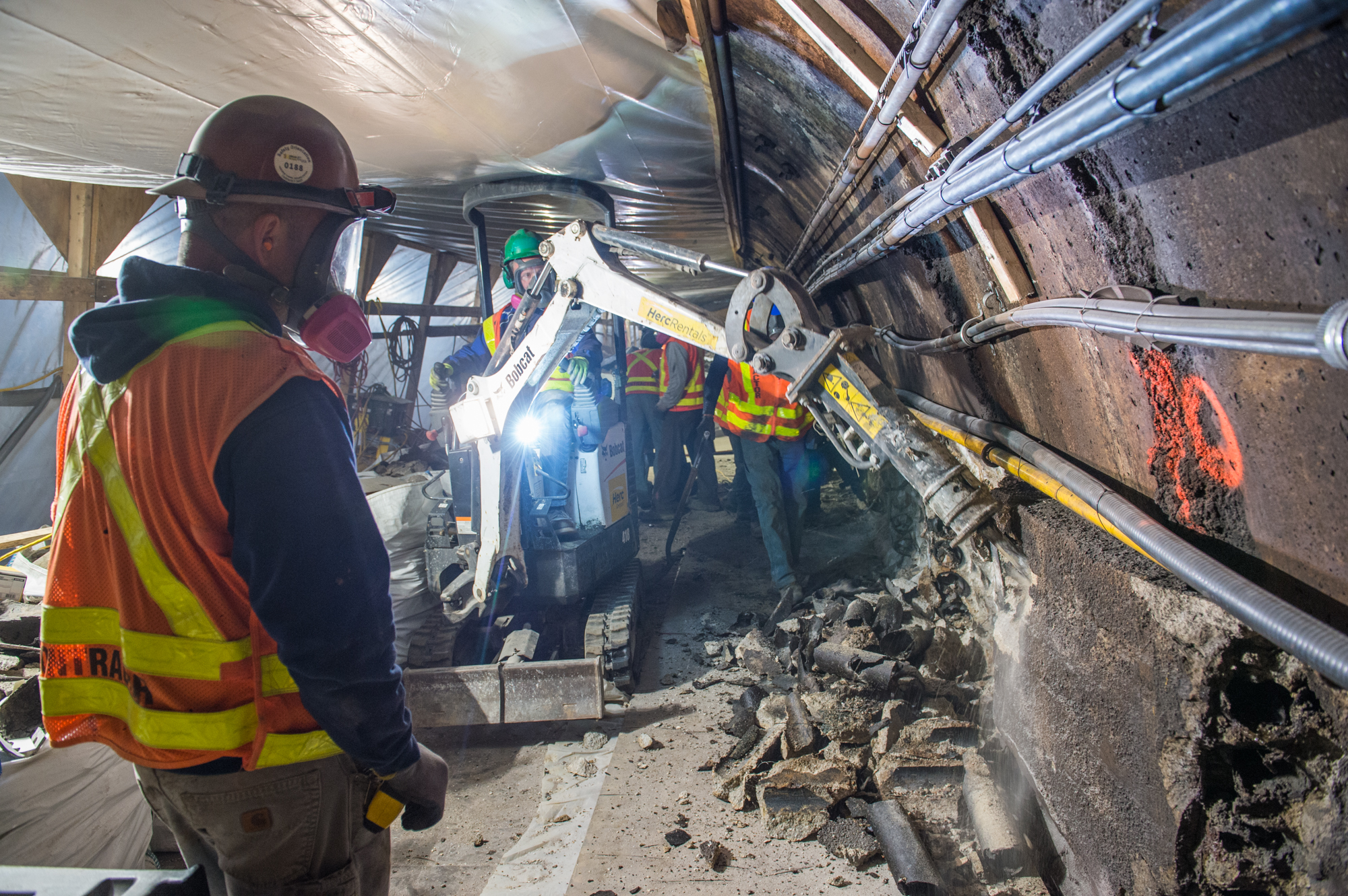 MTA worker assesses tunnel damage