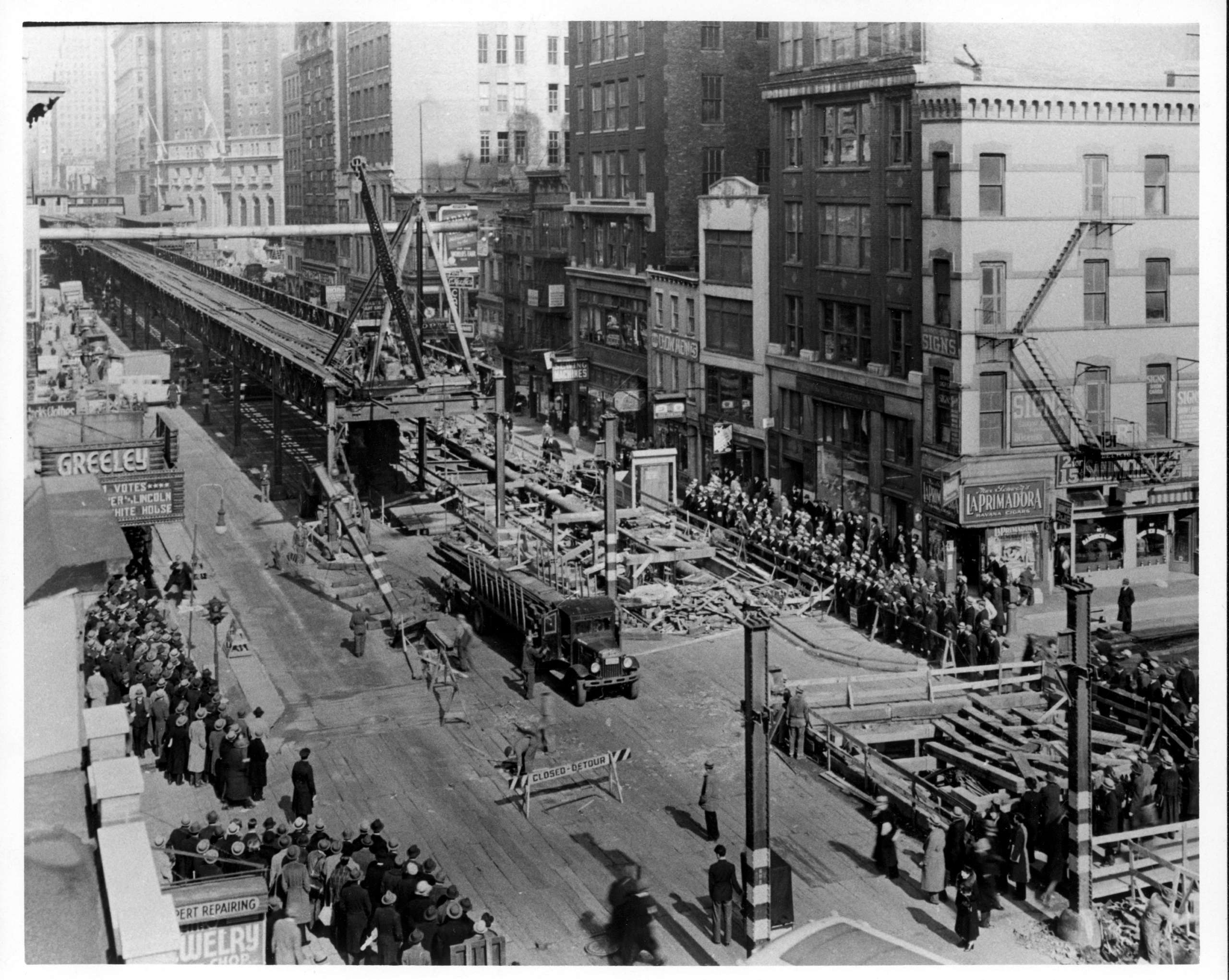 Aerial view of dismantling the Sixth Avenue El and building the 6th Av IND line