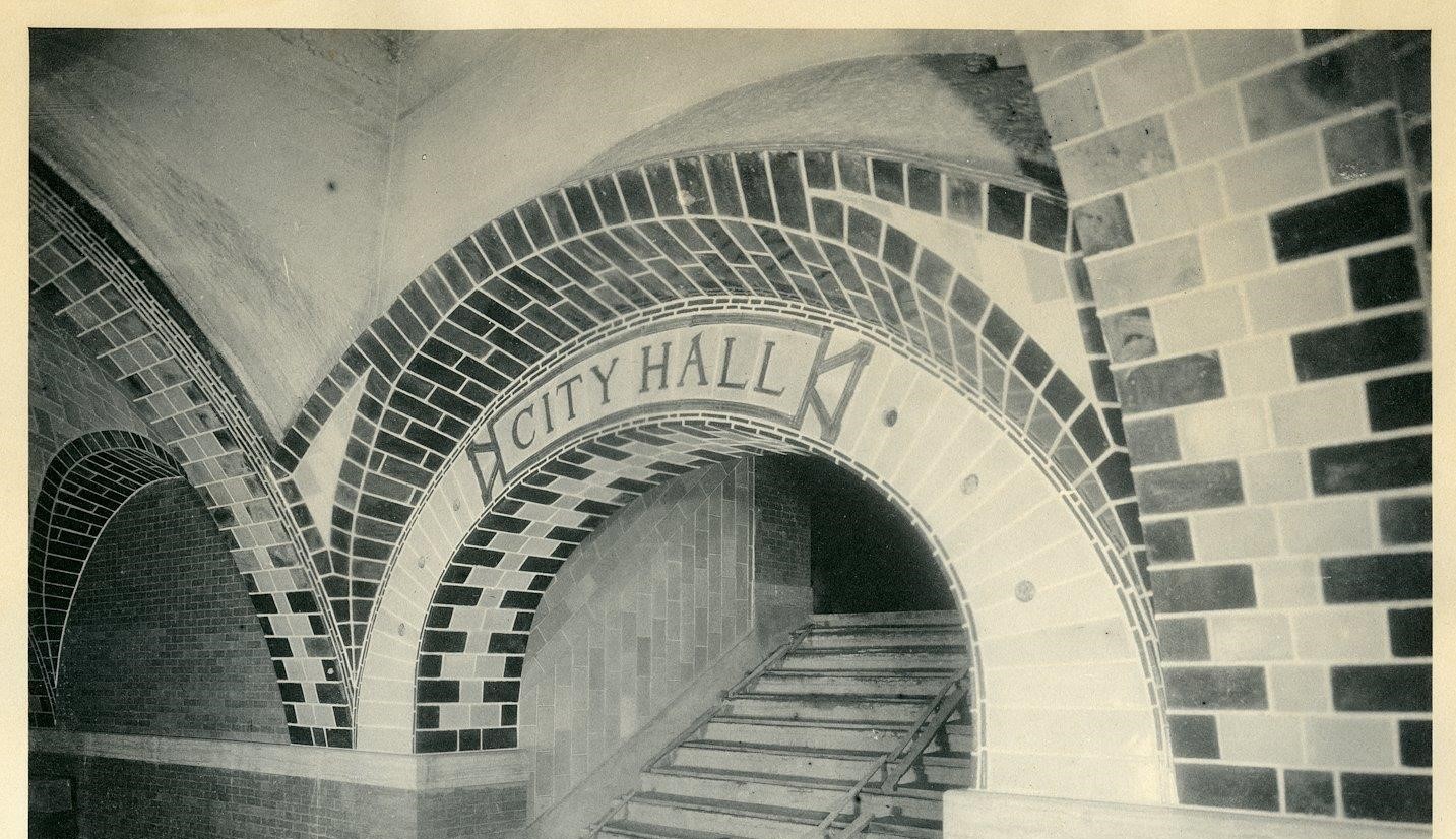 Black and white photograph of Old City Hall Station arch