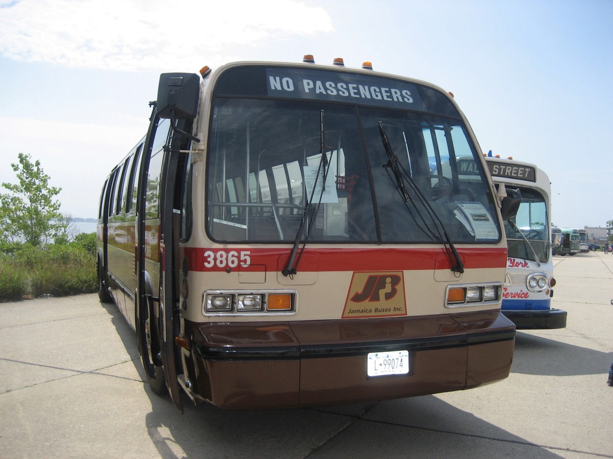 Bus 3865 parked alongside another vintage bus