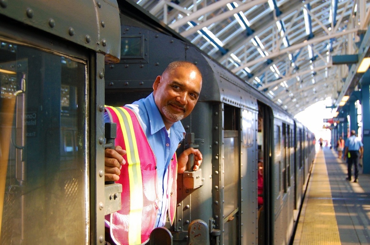 Conductor on vintage R1/9 subway car at the Coney Island station