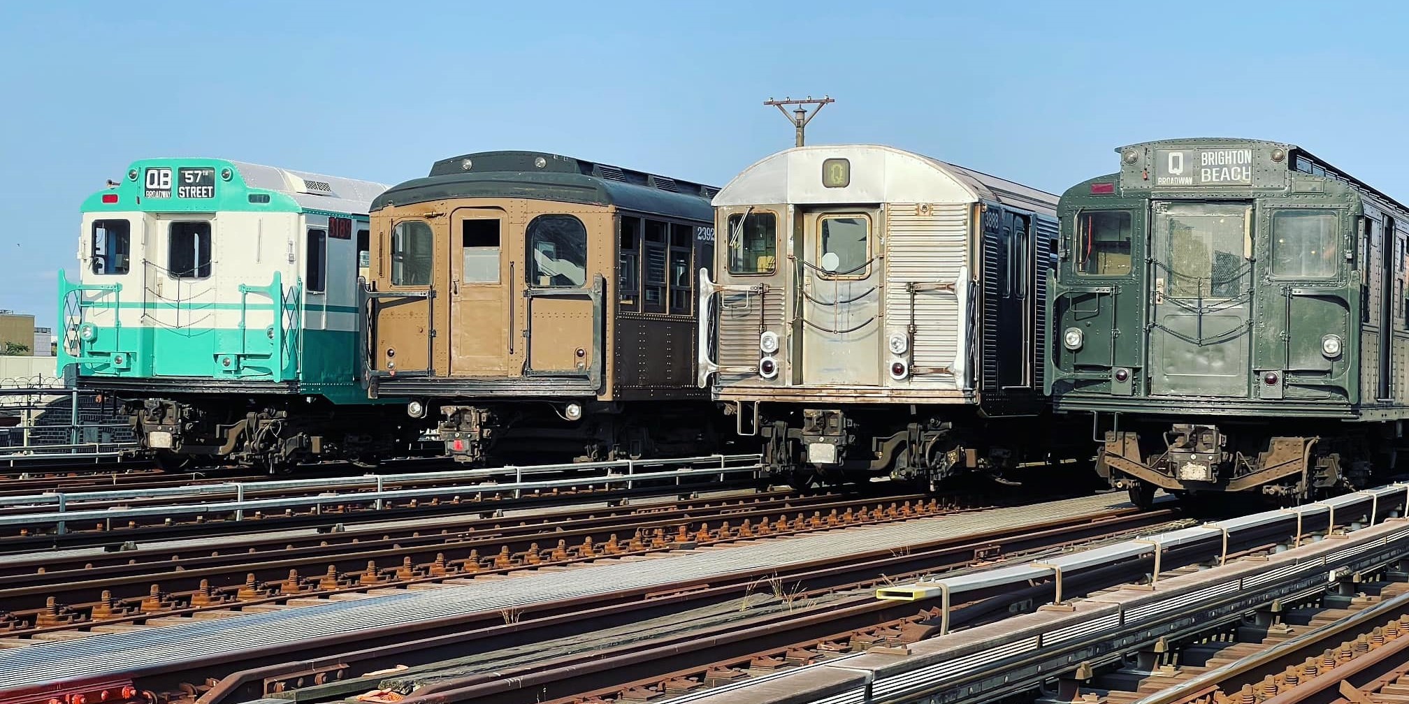 Vintage trains lined up on tracks near Brighton Beach subway station for Parade of Trains 