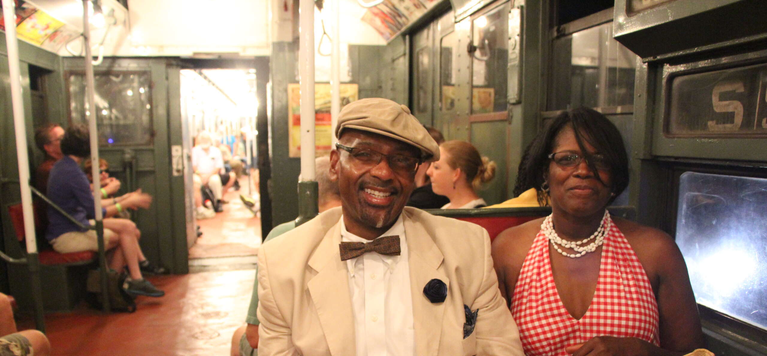 Guests on 1930s R1-9 Train; Photo by James Giovan, Courtesy of the New York Transit Museum