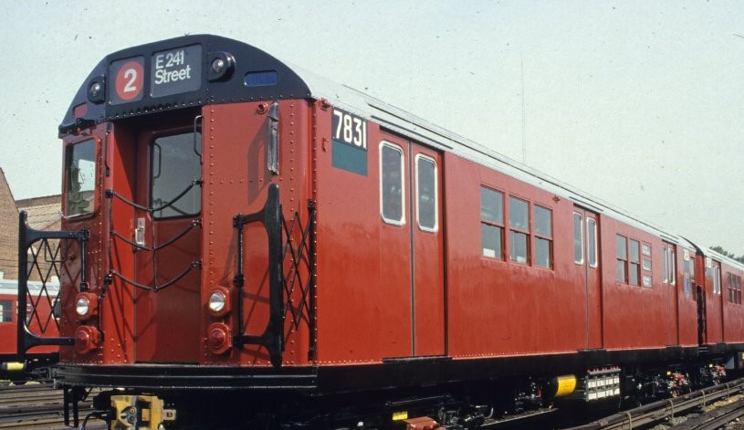 Redbird train on the tracks.
