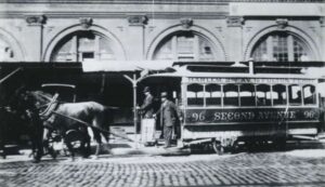 Horse pulls horsecar.