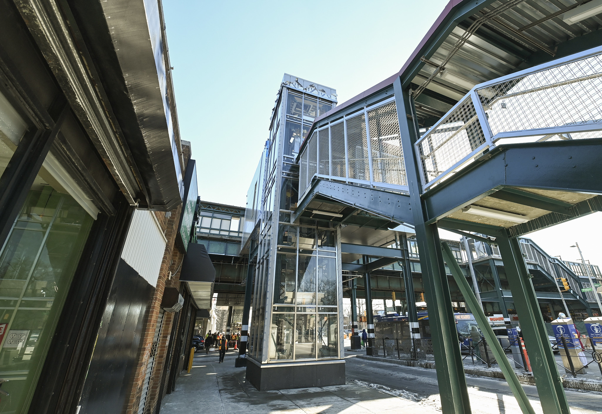 New glass elevator structure at Woodhaven Blvd station.
