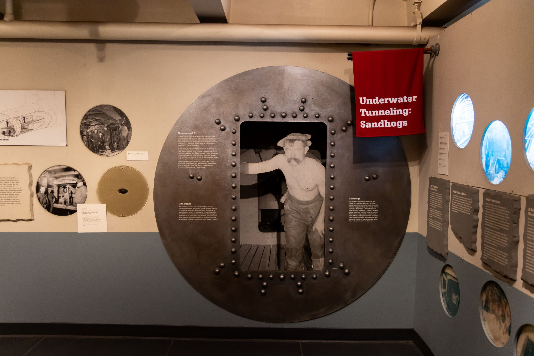 Steel Stone and Backbone Exhibit with subway tunnel worker display