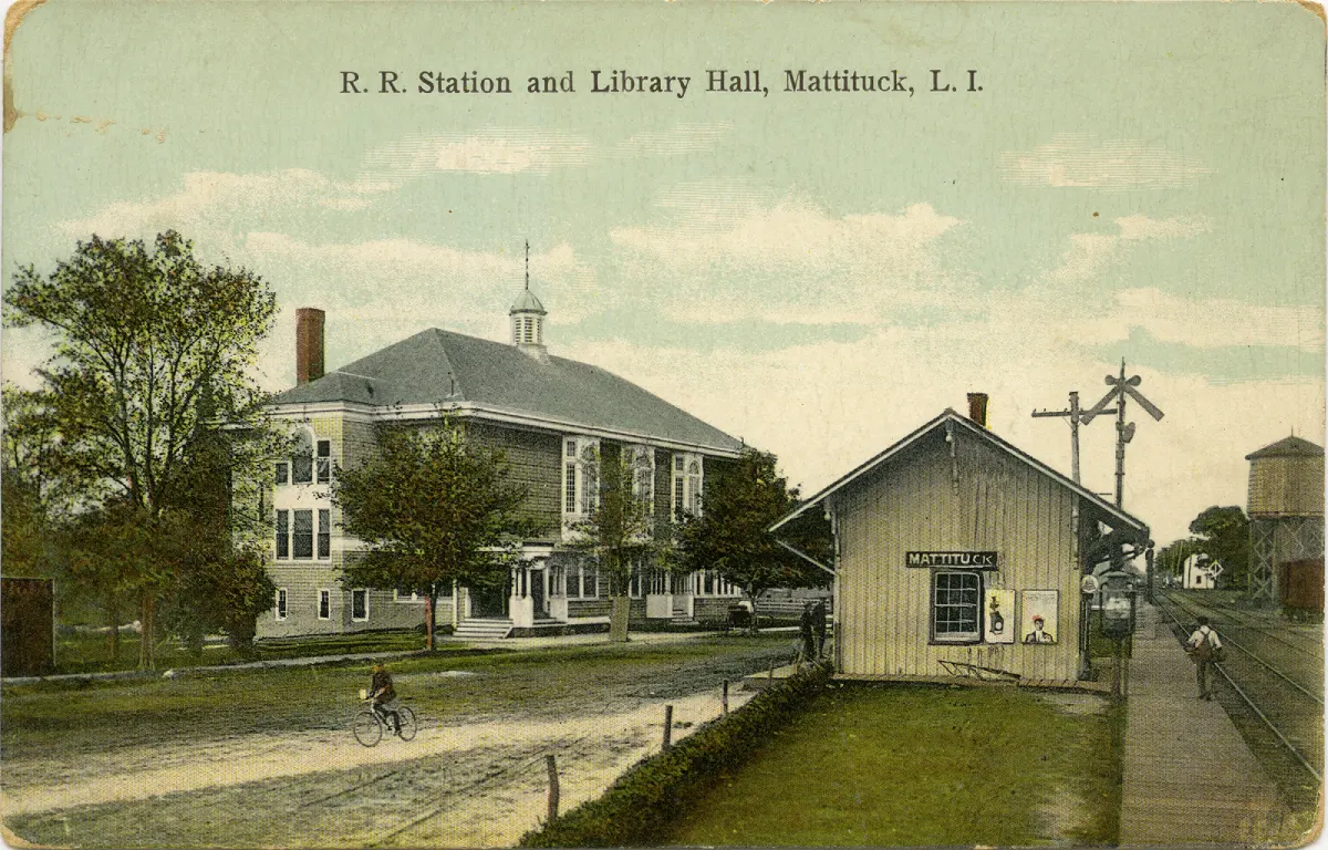 Postcard with drawing of R.R Station and Library Hall