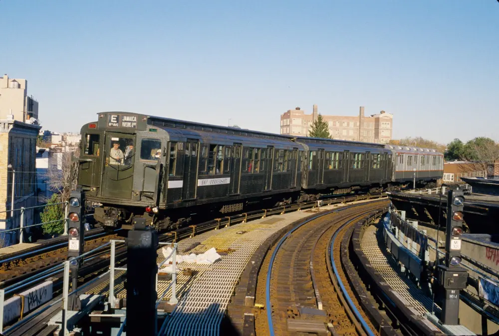 Train of R1/9 cars on an elevated track during nostalgia ride