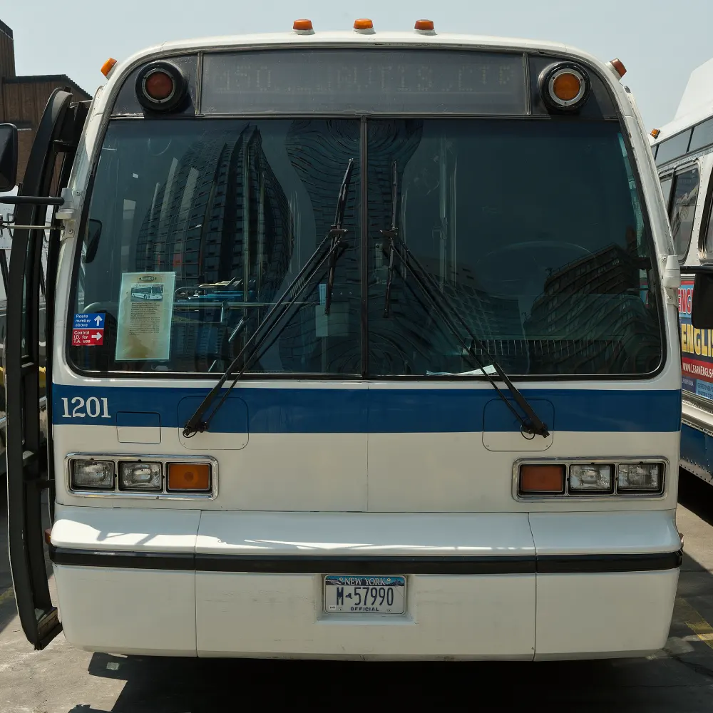 White and blue bus number 1201