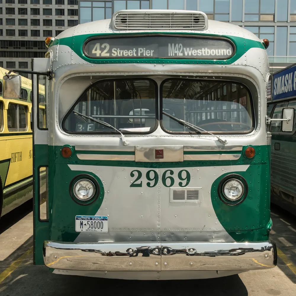 Green and white bus number 2969