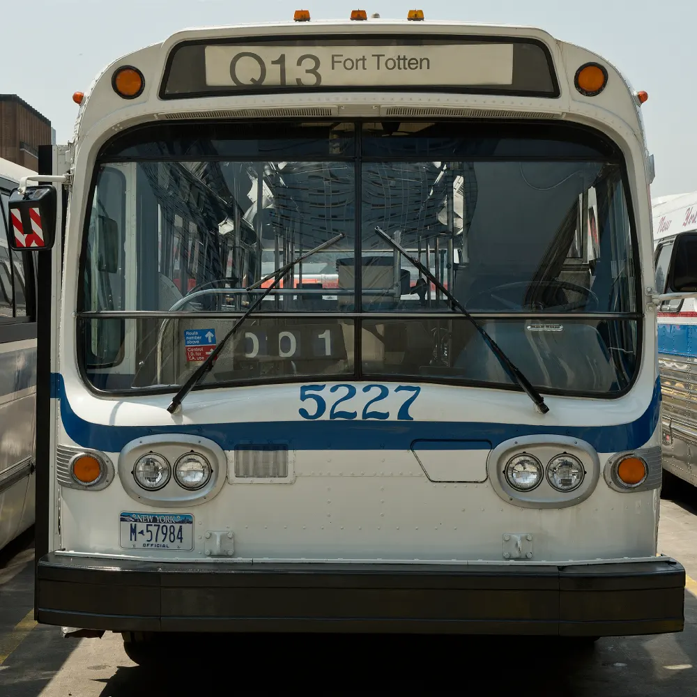 White and blue bus number 5227