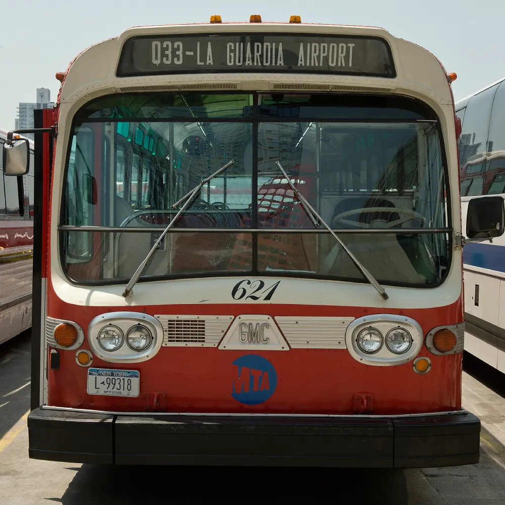 Red and white bus number 621