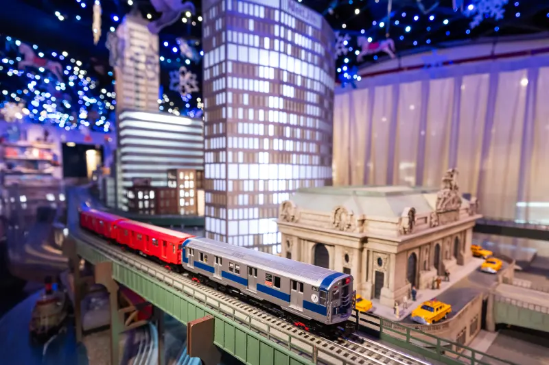 Model train circles a miniature Grand Central at the Holiday Train Show