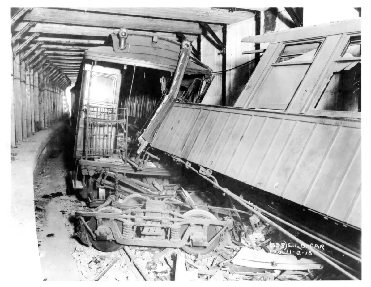 Black & white photo of a train wreck
