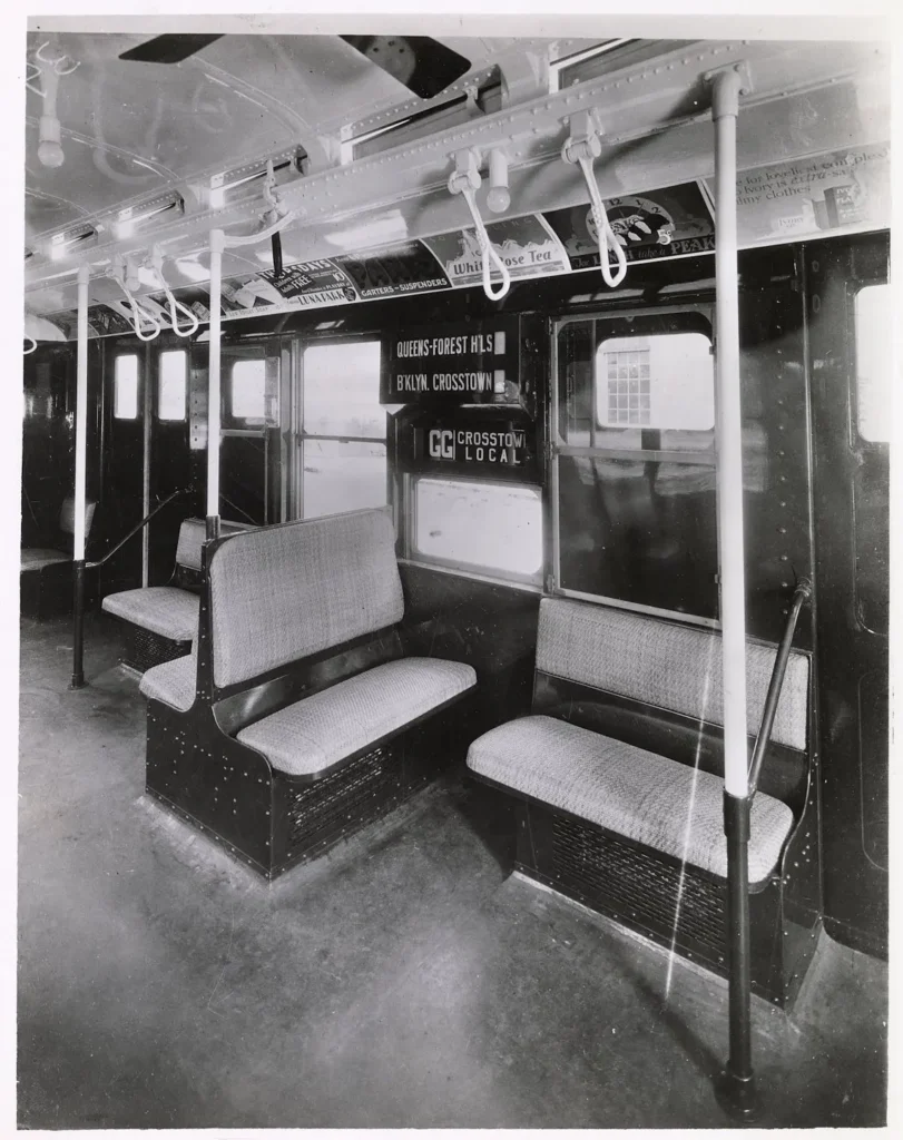 black & white photo of the interior seats of the R1 car