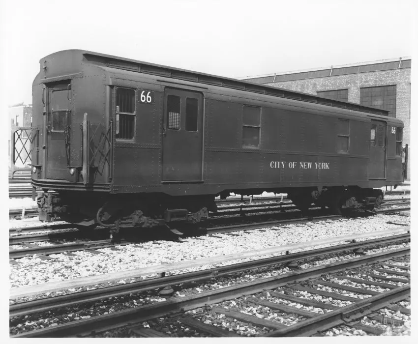 1940 black & white photo of an R8A car sitting idle on the tracks