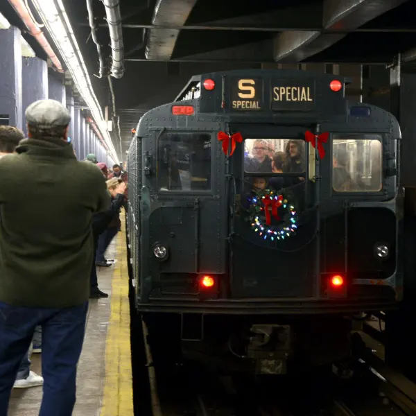 Passengers boarding holiday train ride