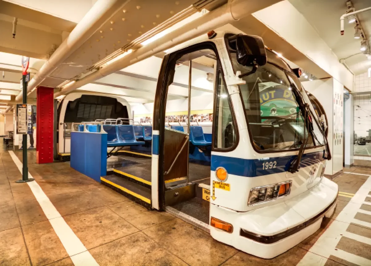 Blue and white bus on view at the museum in Brooklyn