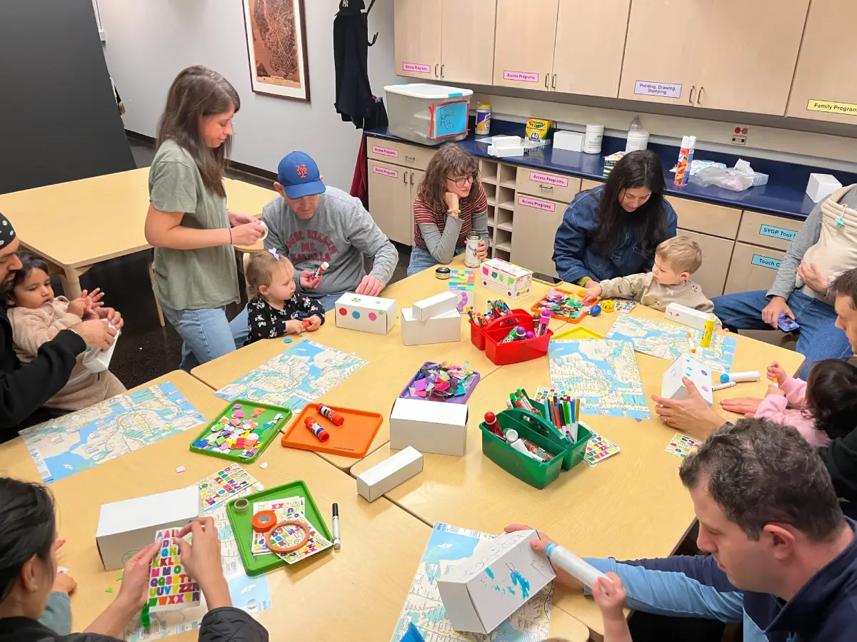 Families participating in an activity at the museum