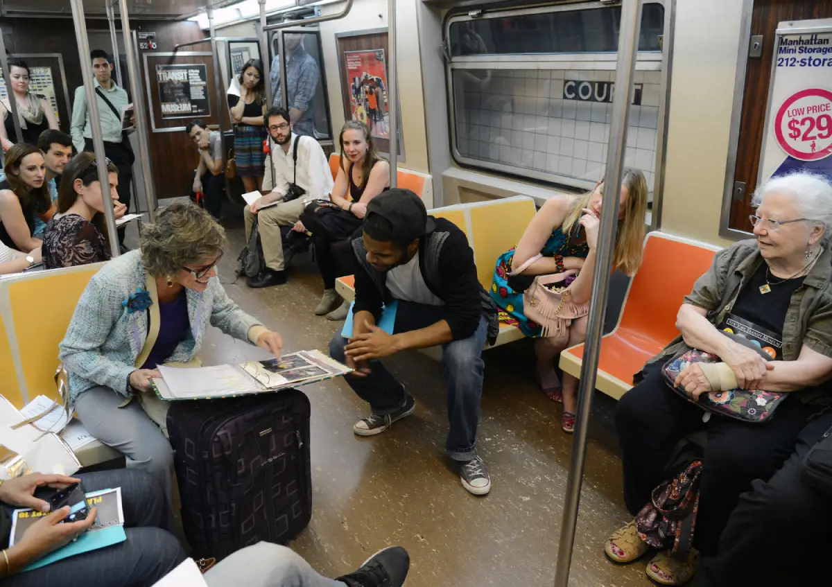 Group of adults sitting together on a vintage train