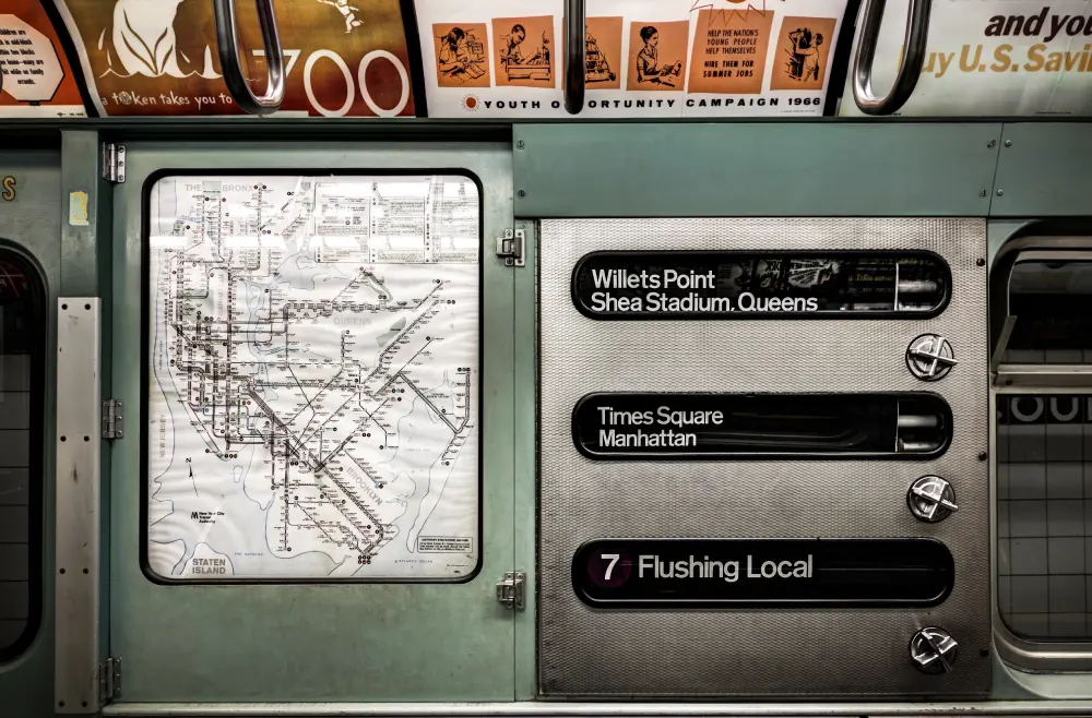 Subway map and roll sign in interior of vintage subway car