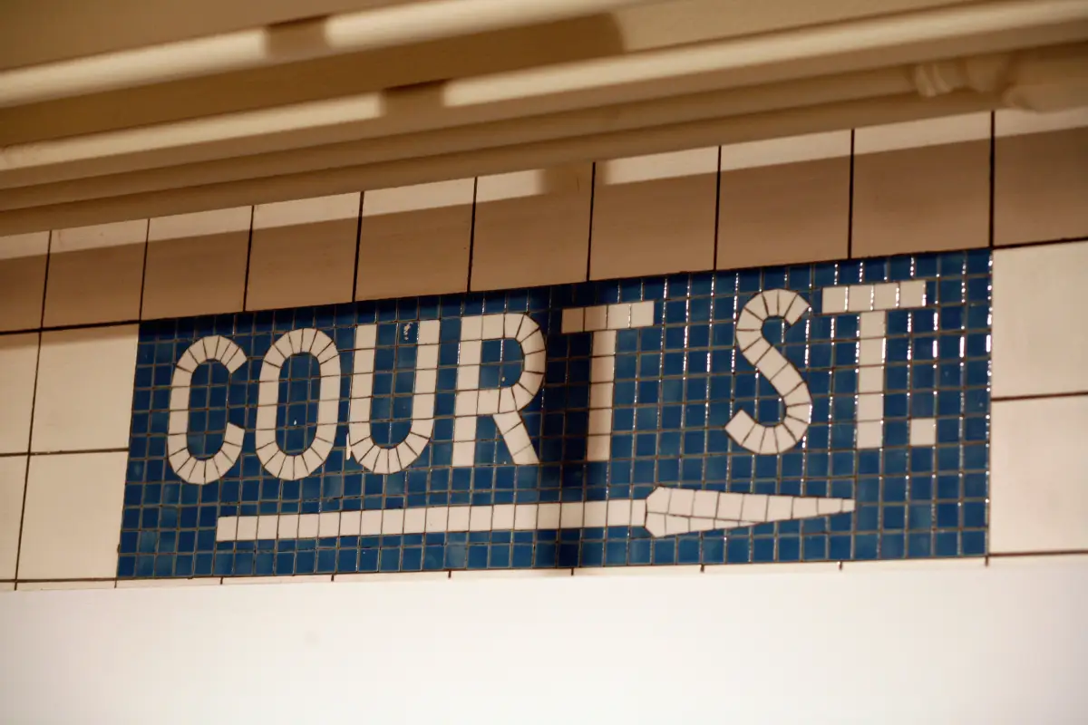 Court St mosaic with arrow