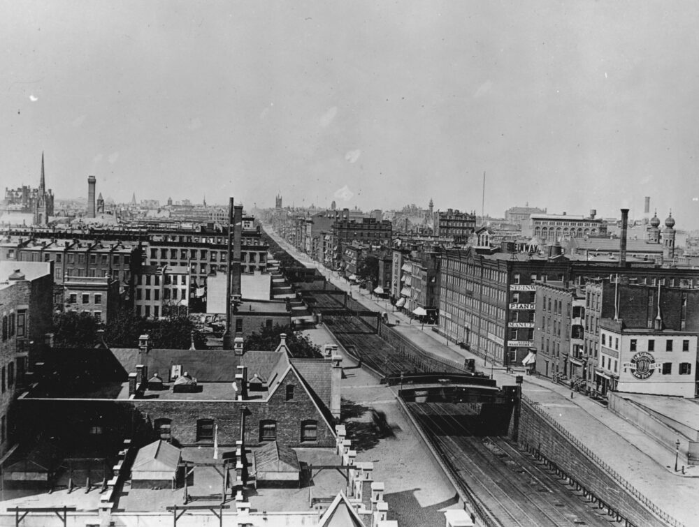 View north of Grand Central featuring train tracks crossed by bridges along Park Avenue.