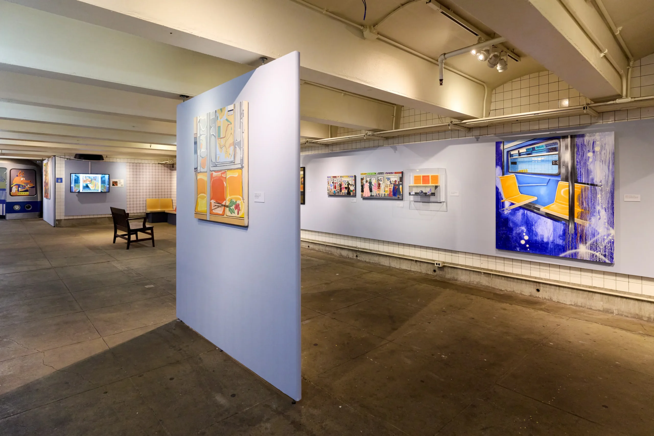 The exhibit "Ode to the Orange Seats" on view at the New York Transit Museum.