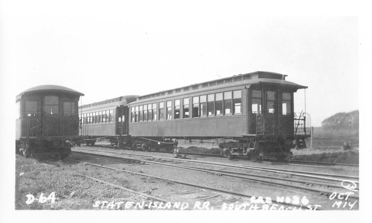 Train car sits on tracks of the South Beach Line.